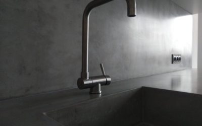 The kitchen interior arrangement with a concrete countertop